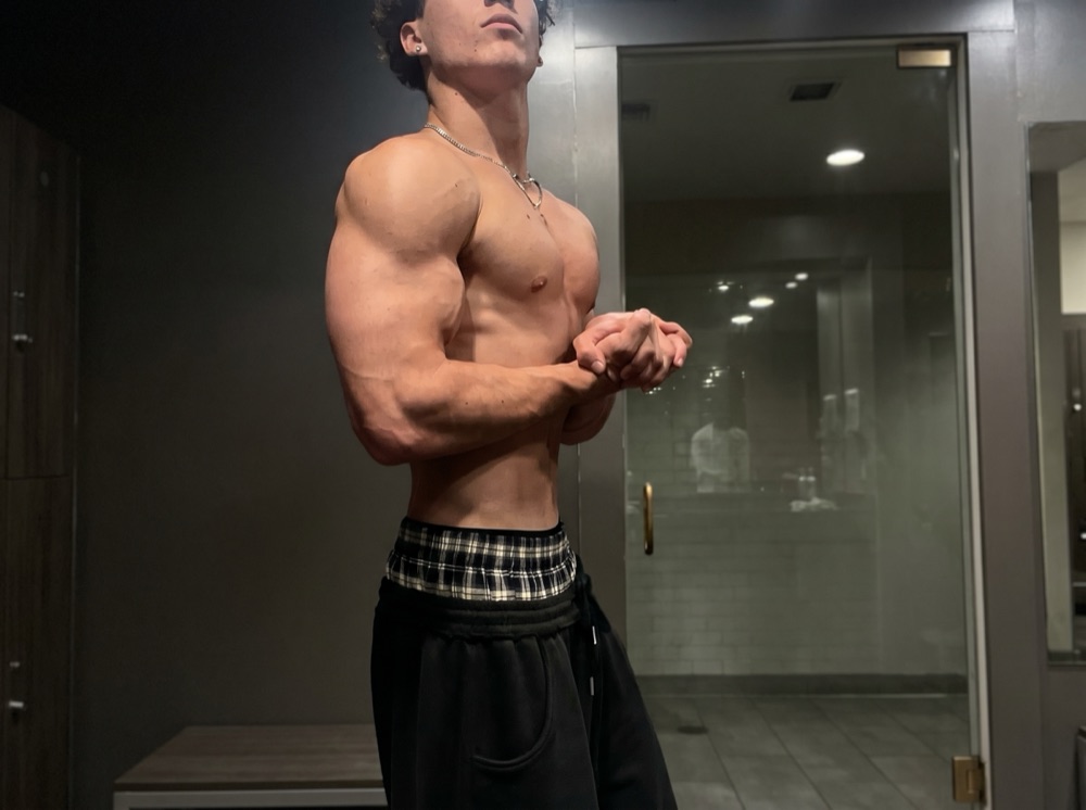 After photo: same man four months later, shirtless and visibly leaner with more developed shoulders and chest.