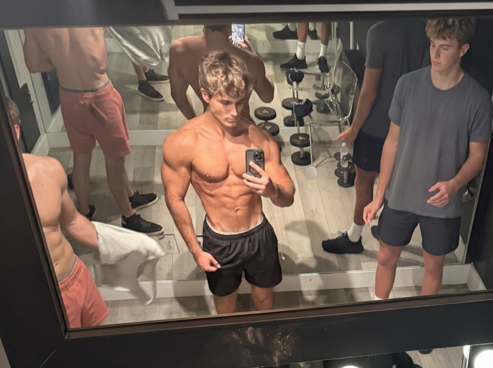 After photo: same man in the gym locker room twelve weeks later, visibly leaner with more developed shoulders and chest.
